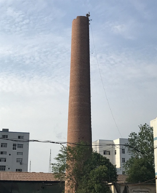 長春煙囪人工拆除-怎樣協(xié)調(diào)處理煙囪拆除廢棄垃圾